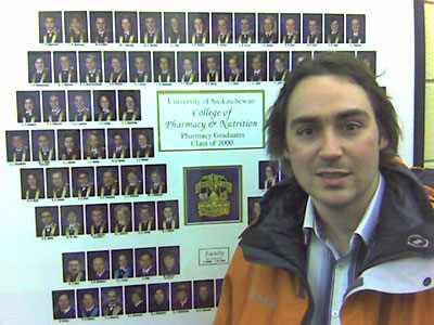 Matt in front of our grad photo